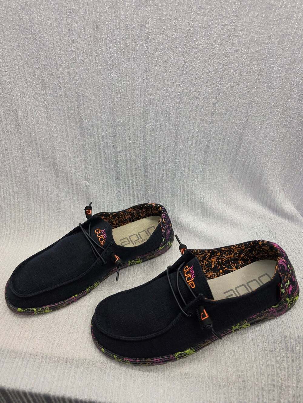 Hey Dude Wendy GLO Sneakers Black Paint Splatter Casual Slip-On Shoes